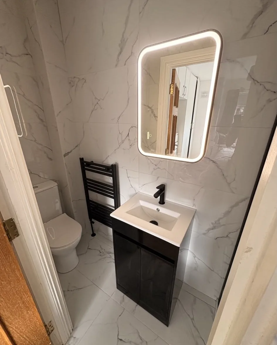 Illuminated bathroom mirror and vanity installation in Sligo