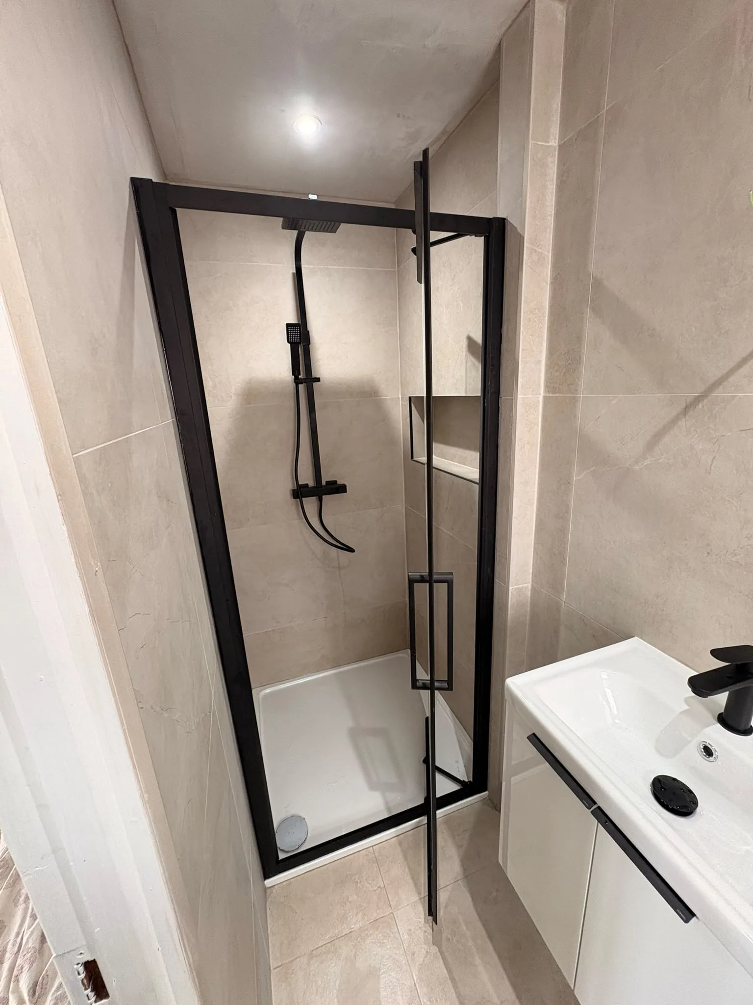 Walk-in shower enclosure installed during a Sligo bathroom renovation